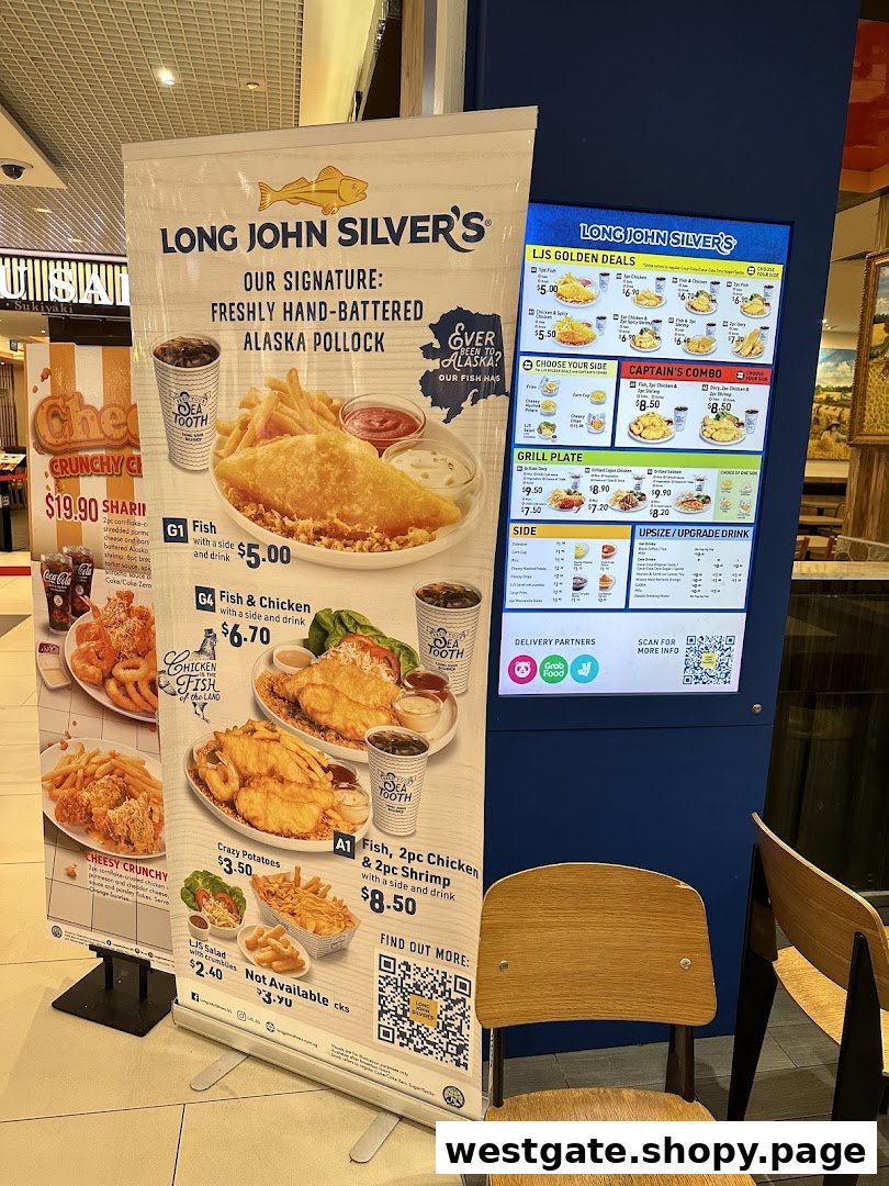 A large banner and digital screen display Long John Silver's menu items, prices, and special deals.