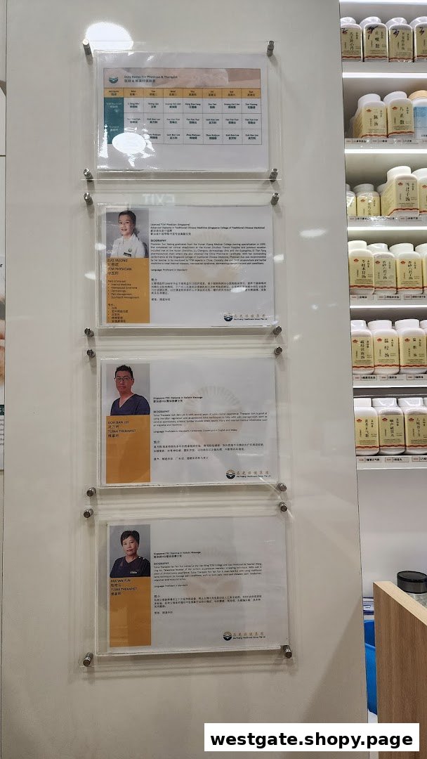 Internal view of Ma Kuang TCM Clinic, showcasing staff profiles, physician schedule, and product displays.
