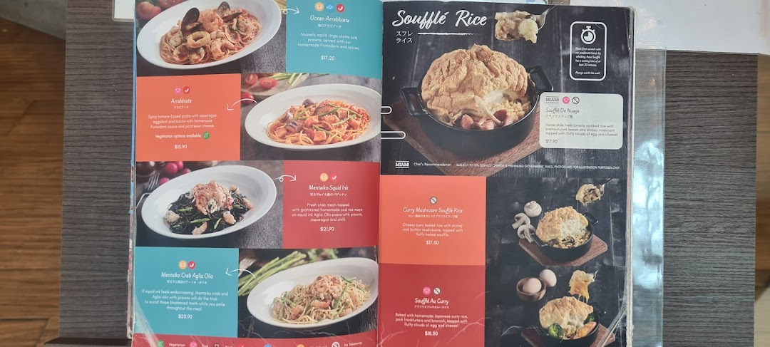 A menu displaying various pasta and soufflé rice dishes with descriptions and prices.