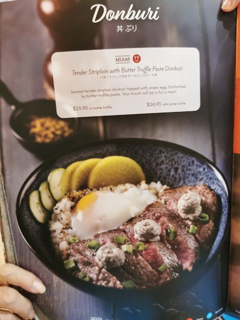 A menu page featuring a Tender Striploin with Butter Truffle Paste Donburi dish.