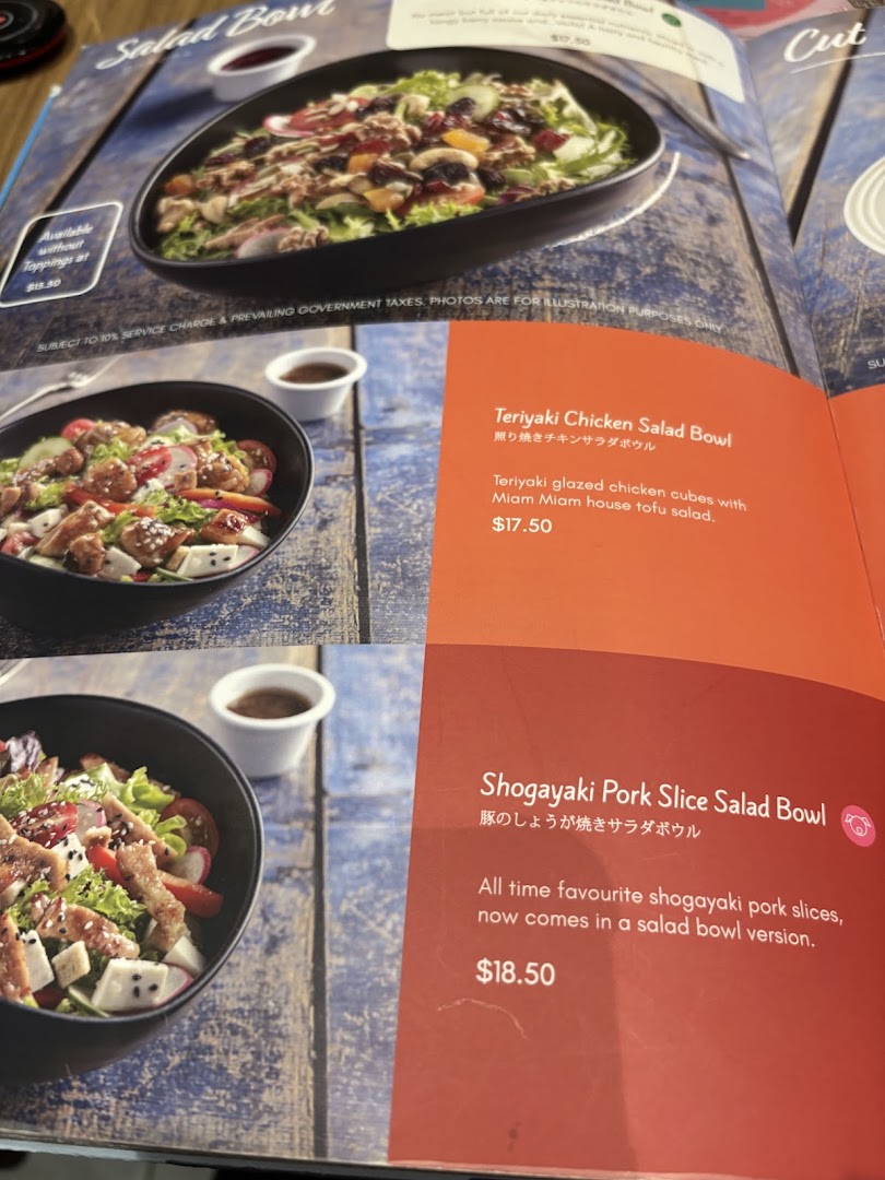 A menu page from Miam Miam showcasing various French-Japanese inspired salad bowls.