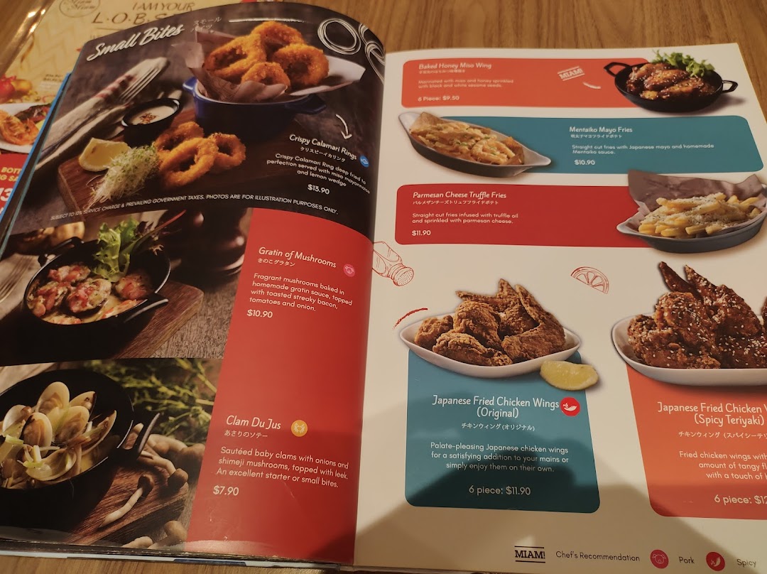 A detailed menu page showcasing a variety of French-Japanese fusion appetizers and small bites.
