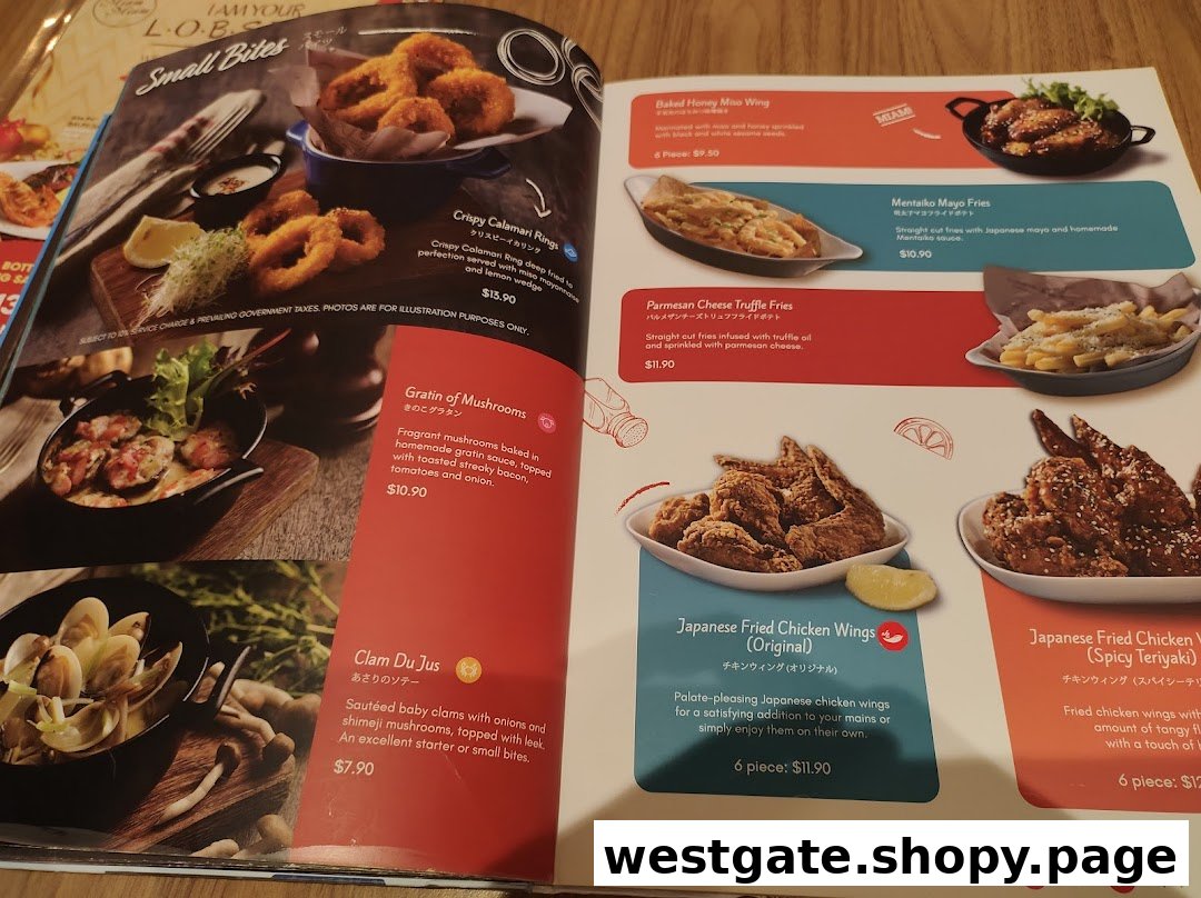A detailed menu page showcasing a variety of French-Japanese fusion appetizers and small bites.