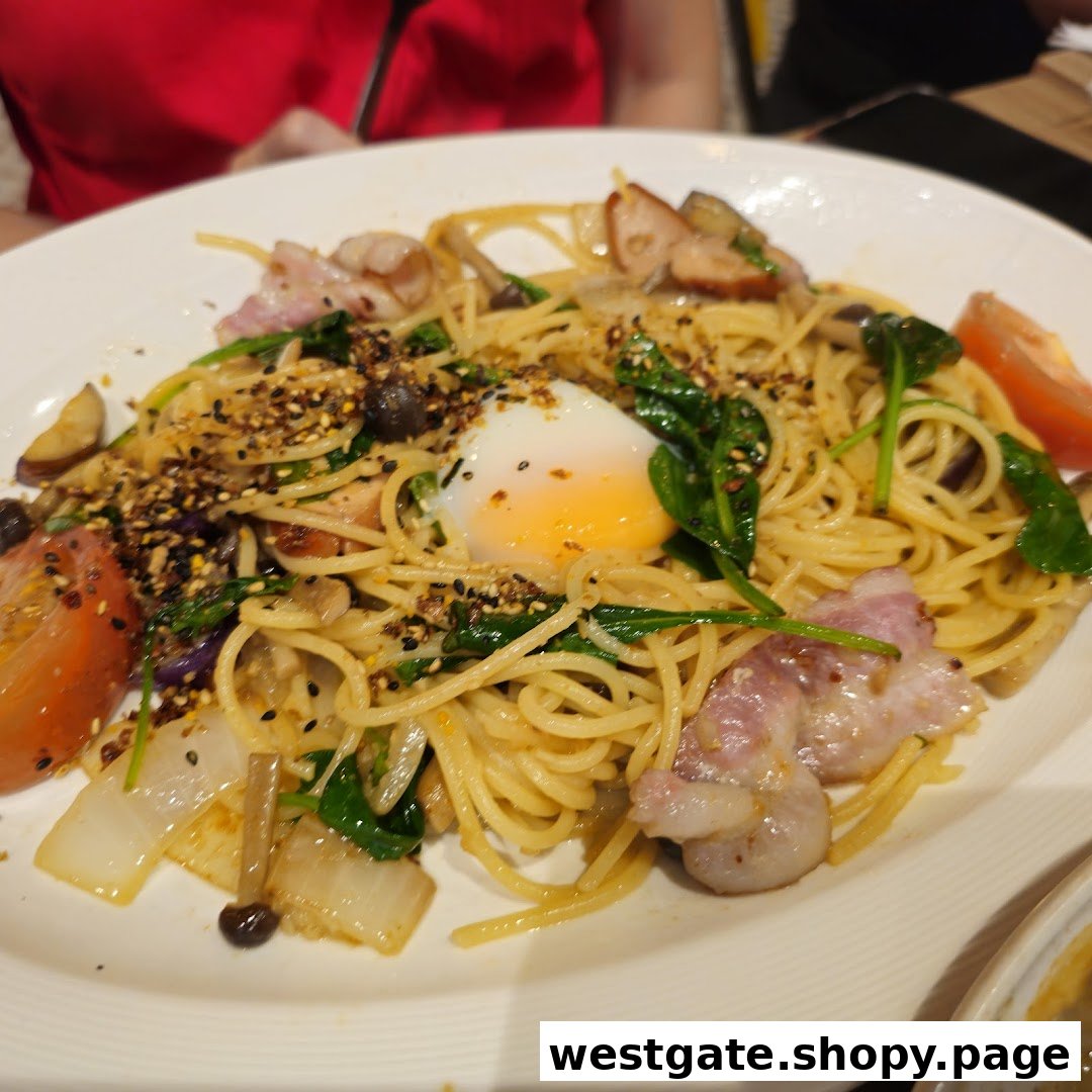 A close-up of a delicious pasta dish with bacon, vegetables, and a poached egg.