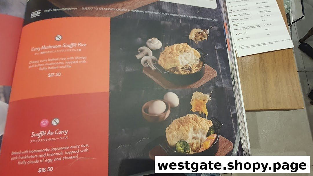 A close-up view of a menu page featuring two soufflé rice dishes with descriptions and prices.