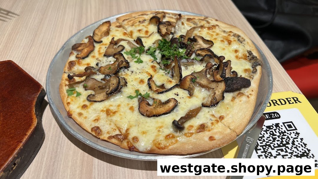 A delicious mushroom pizza with melted cheese and fresh herbs on a table, ready to be enjoyed.