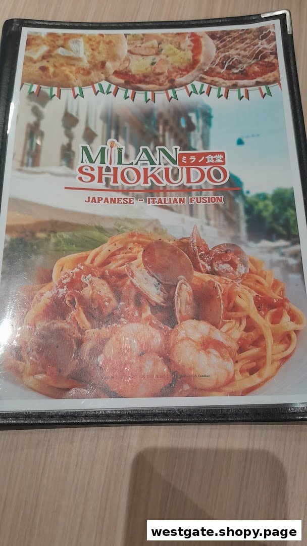 The cover of Milan Shokudo's menu, featuring their Japanese-Italian fusion cuisine and a seafood pasta dish.