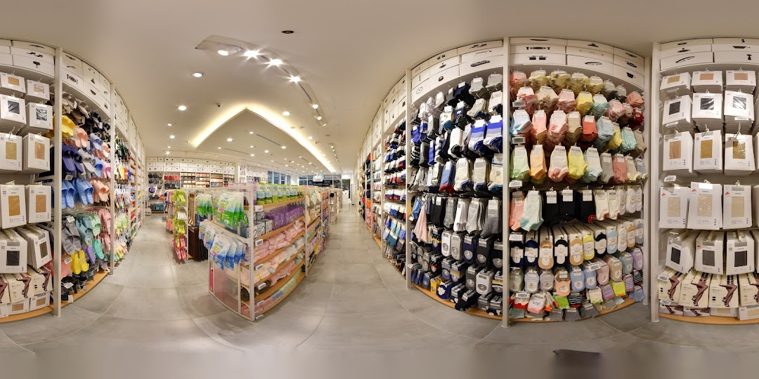 A wide-angle view of the MINISO store interior, showcasing aisles filled with diverse lifestyle products.