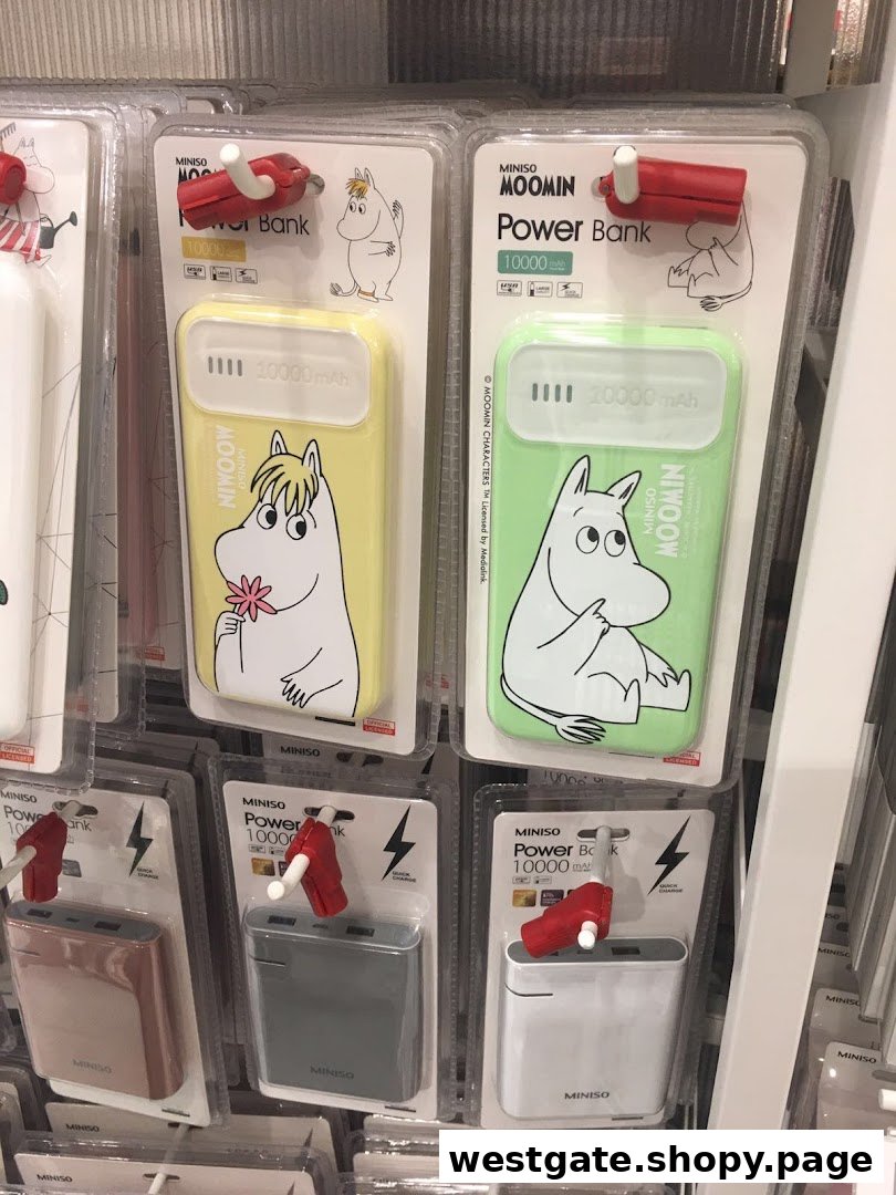 A display of MINISO power banks, including Moomin-themed designs, showcasing portable charging solutions.