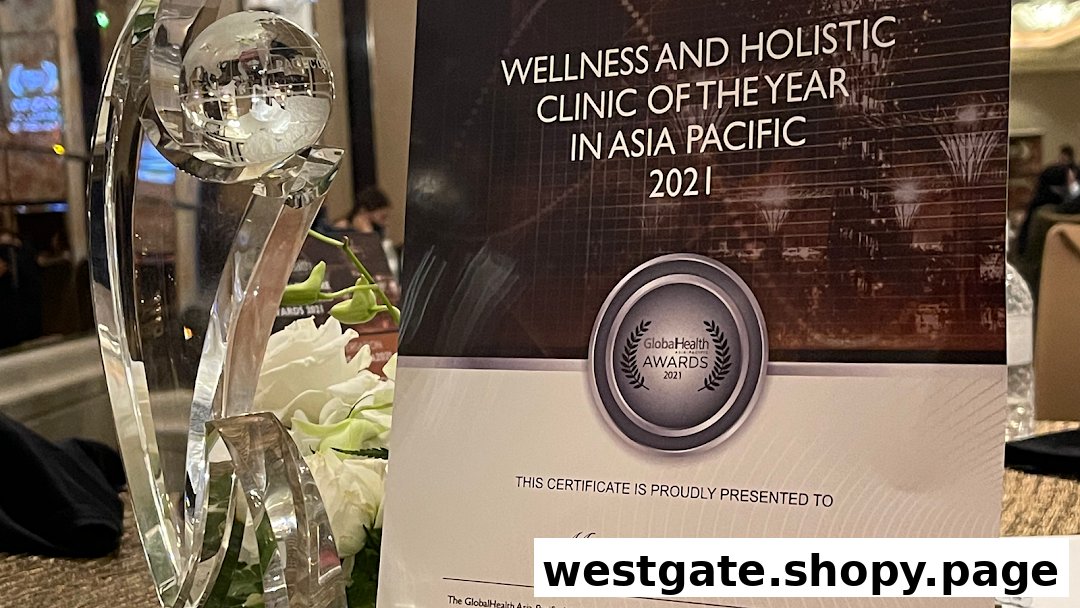 A crystal award trophy and a certificate recognizing Mirage Aesthetic as 'Wellness and Holistic Clinic of the Year'.