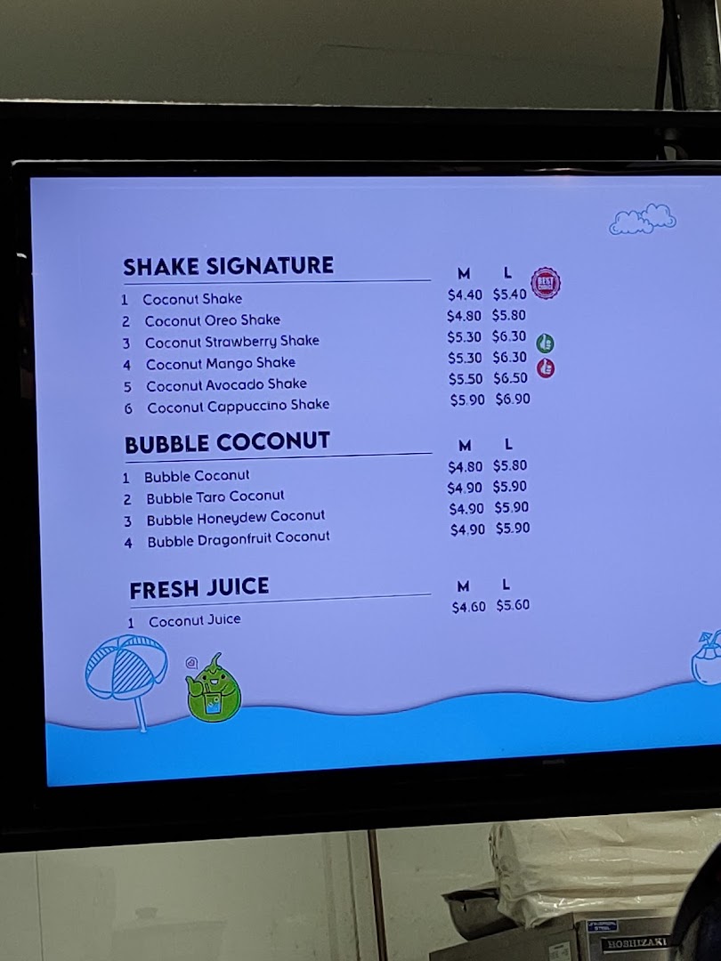 A digital menu board displaying various coconut-based shakes, bubble coconut drinks, and fresh juices.
