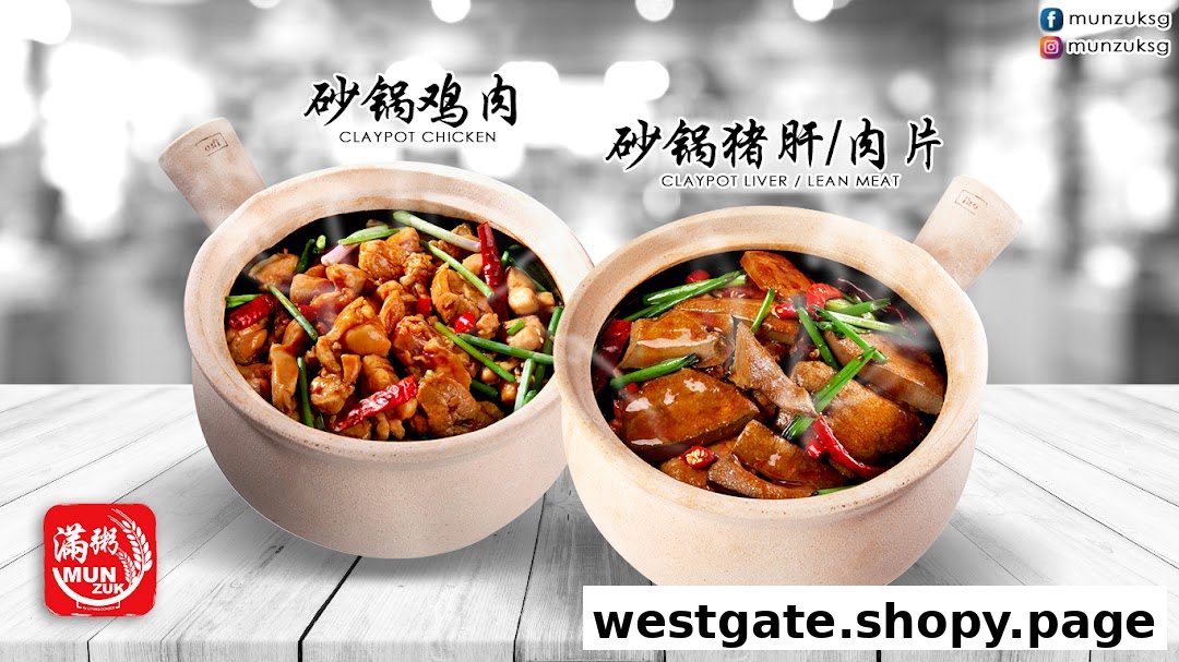Two steaming claypot dishes, Claypot Chicken and Claypot Liver/Lean Meat, from Mun Zuk.