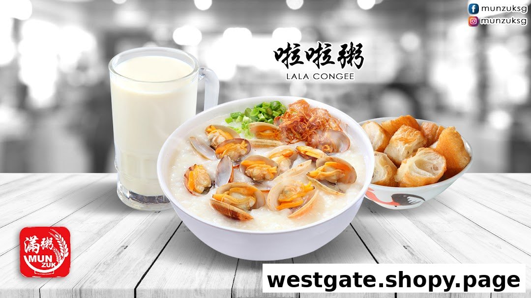 A delicious bowl of lala congee, soy milk, and fried dough sticks on a wooden table.