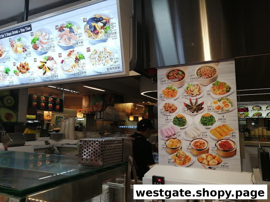 A vibrant display of various congee and side dishes on digital and physical menu boards.
