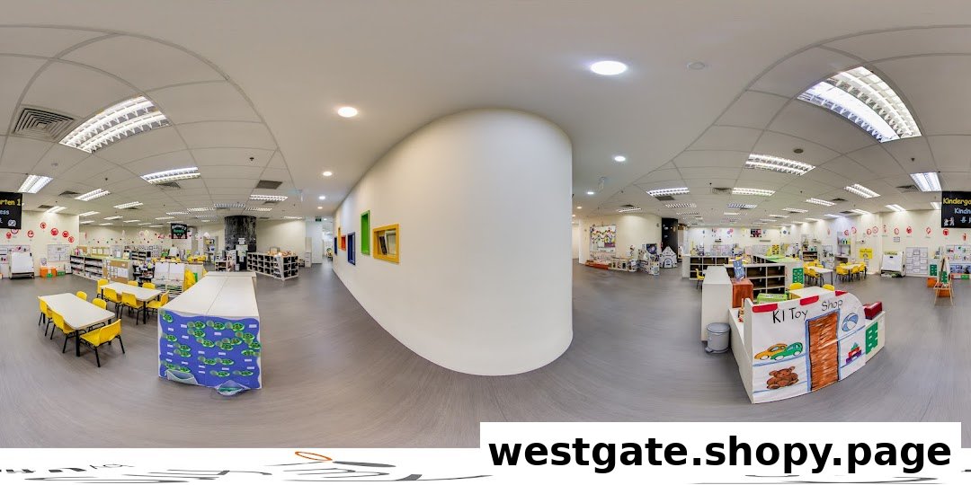 A panoramic view of My First Skool's bright, spacious interior with learning stations and play areas.