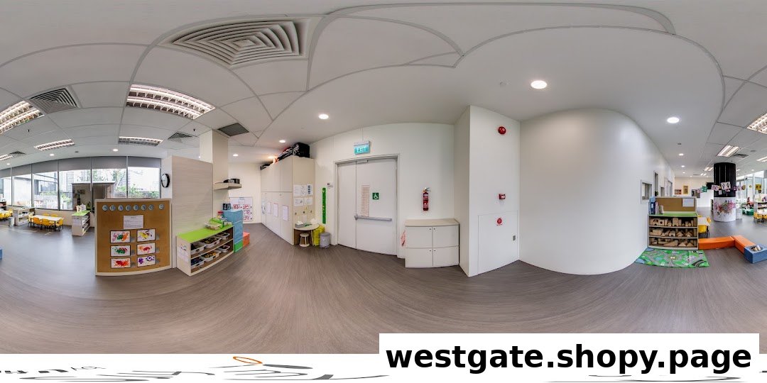 A bright, spacious interior of a childcare center featuring play areas, child-sized furniture, and an exit.