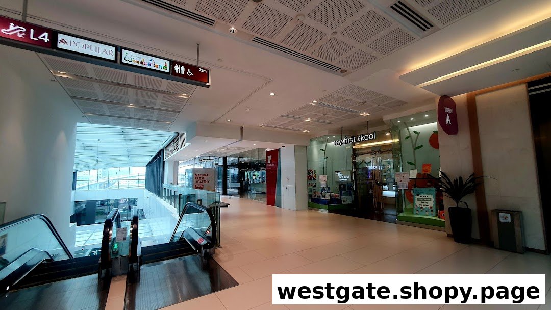 View of My First Skool entrance at Westgate mall, with escalators and mall signage visible.