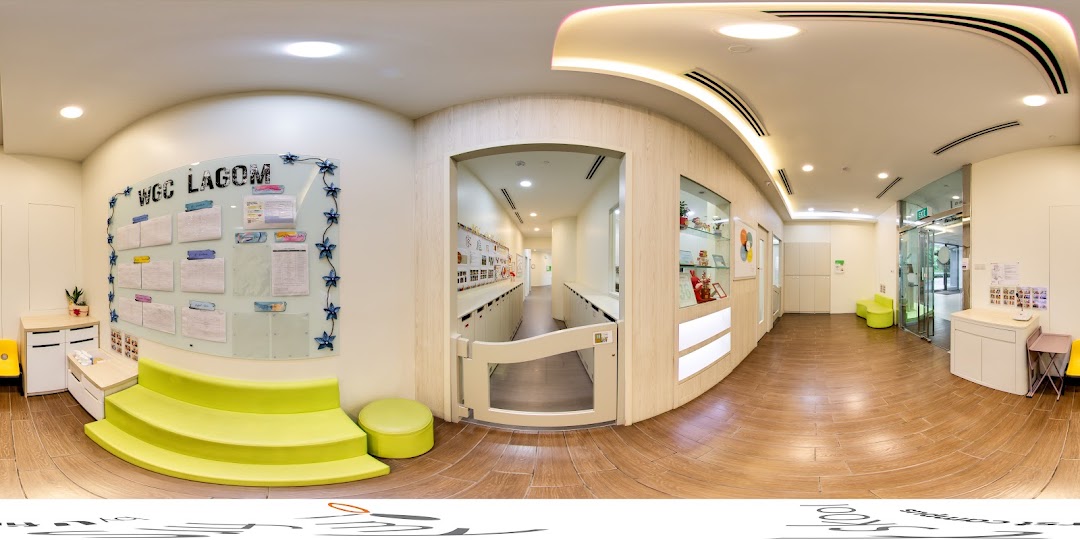 Bright, clean interior of My First Skool childcare center, featuring a reception area, hallway, and child-friendly elements.