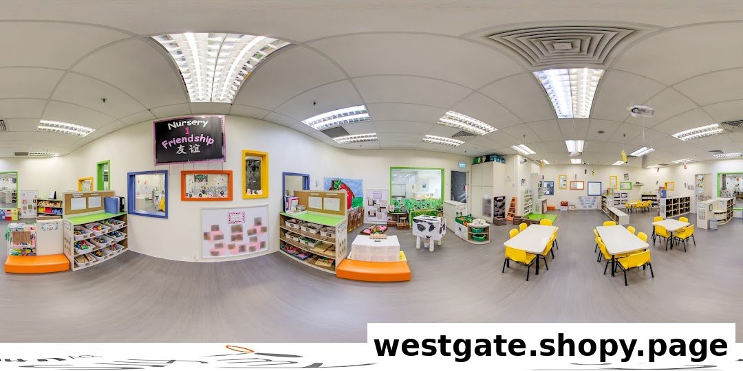 A bright and spacious classroom at My First Skool, featuring colorful learning areas and child-sized furniture.