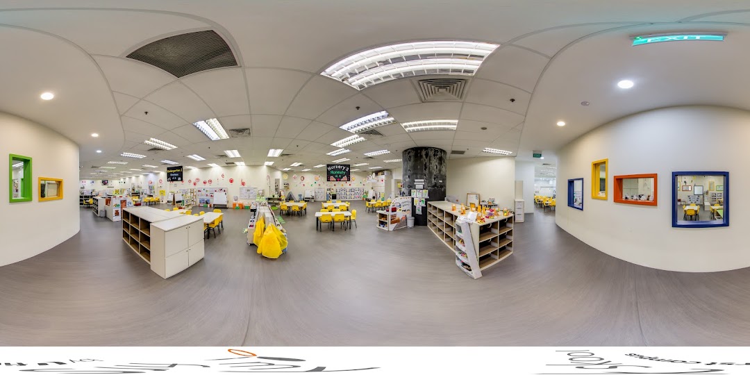 A wide-angle view of My First Skool's bright, organized interior with classrooms and learning areas.