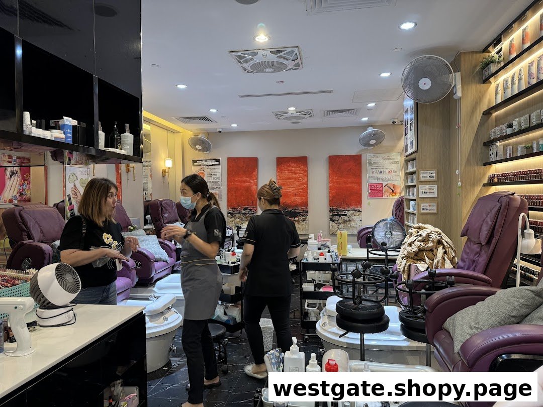 Interior view of N20 Nail Spa showing customers, staff, and pedicure stations with comfortable chairs.