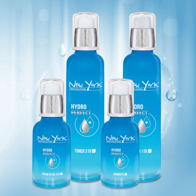 Four blue bottles of New York Skin Solutions 'Hydro Perfect' skincare products.
