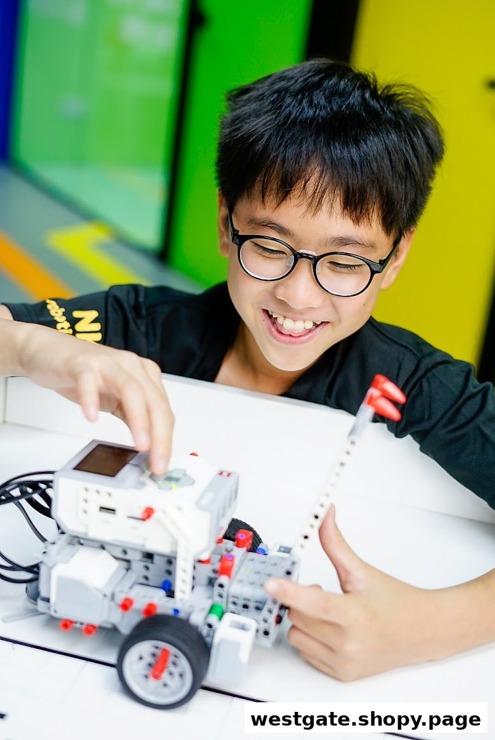 A smiling child with glasses happily engages with a robotics kit, building and learning.