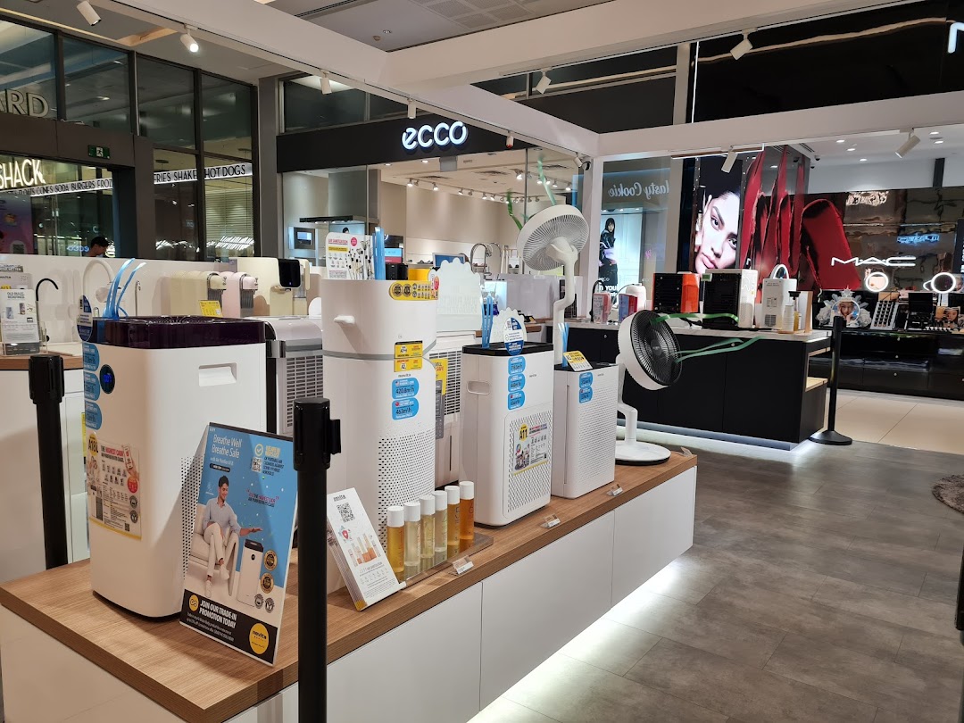 An interior view of Novita showcasing a range of air purifiers, fans, and wellness products on display.