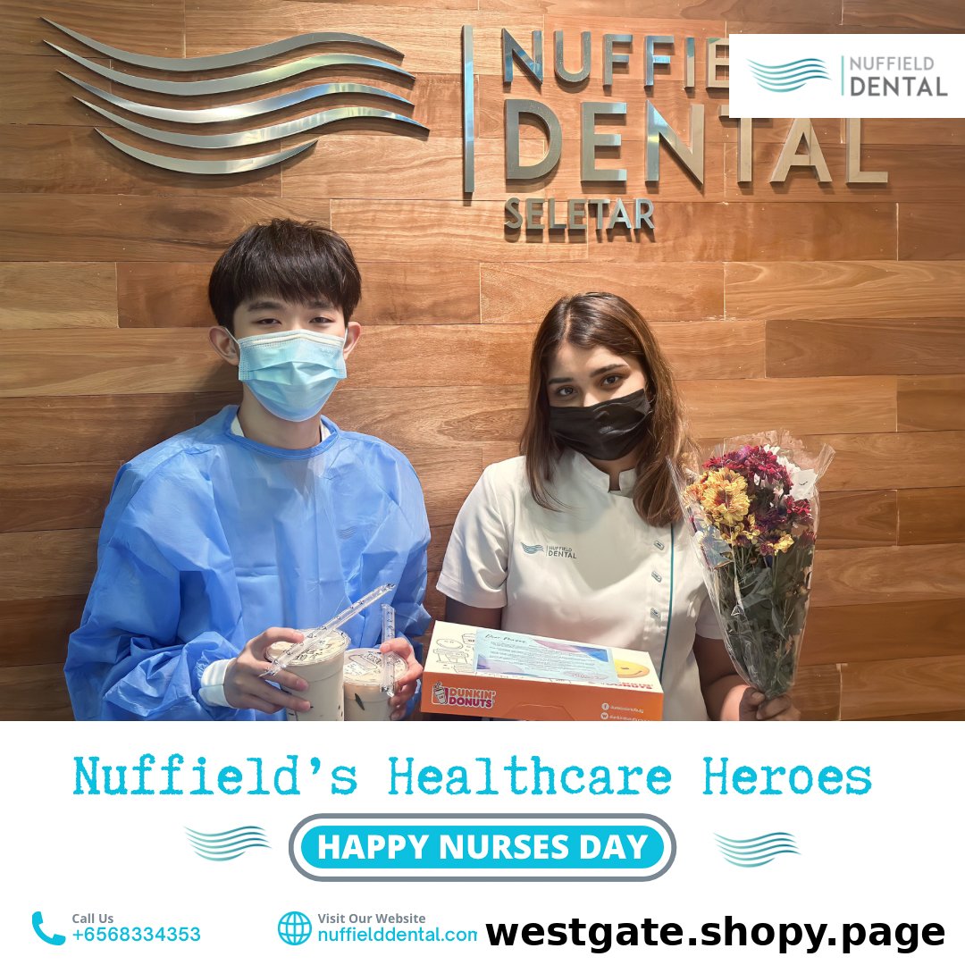 Two individuals, one in a medical gown, holding drinks and gifts inside Nuffield Dental.