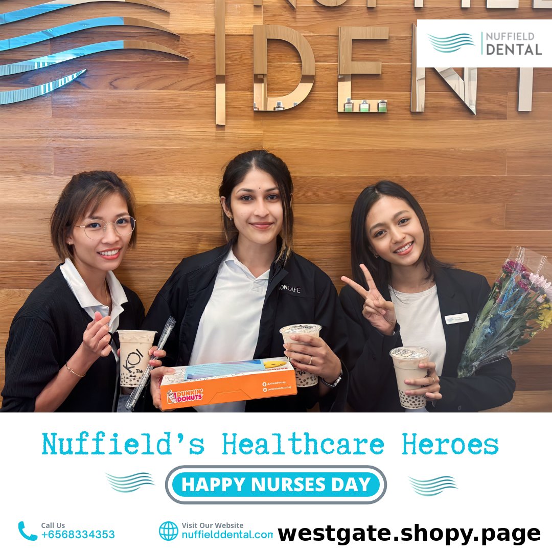 Three Nuffield Dental staff members celebrate Nurses Day with drinks and donuts, showcasing a friendly team.