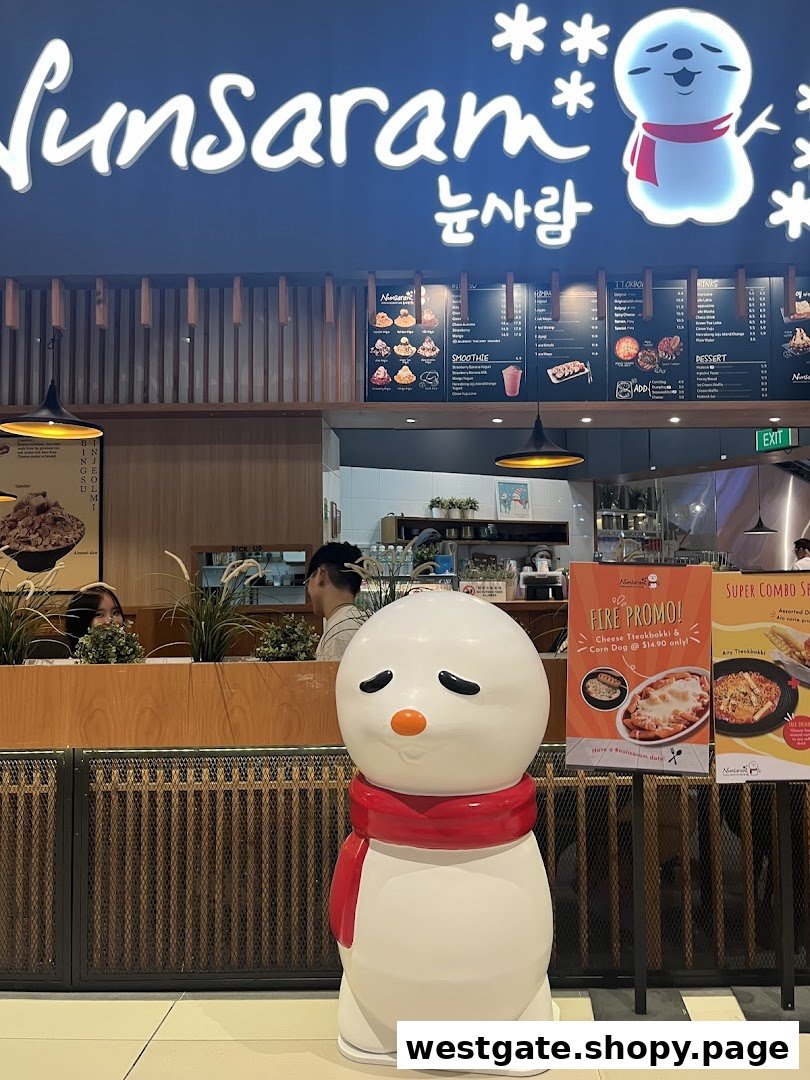 Nunsaram Korean Dessert Cafe entrance featuring its signage, a snowman mascot, and promotional displays.