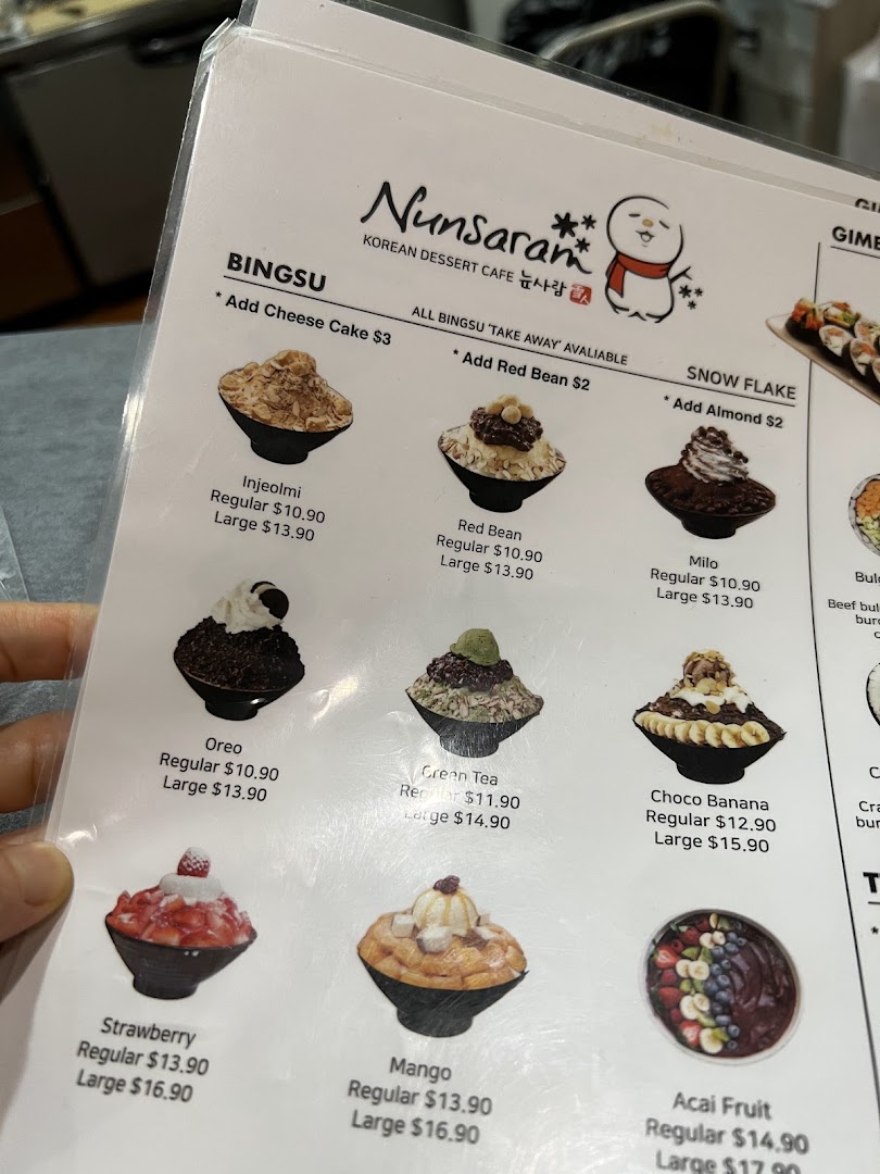 A detailed menu from Nunsaram Korean Dessert Cafe, showcasing various Bingsu and Snow Flake desserts with prices.