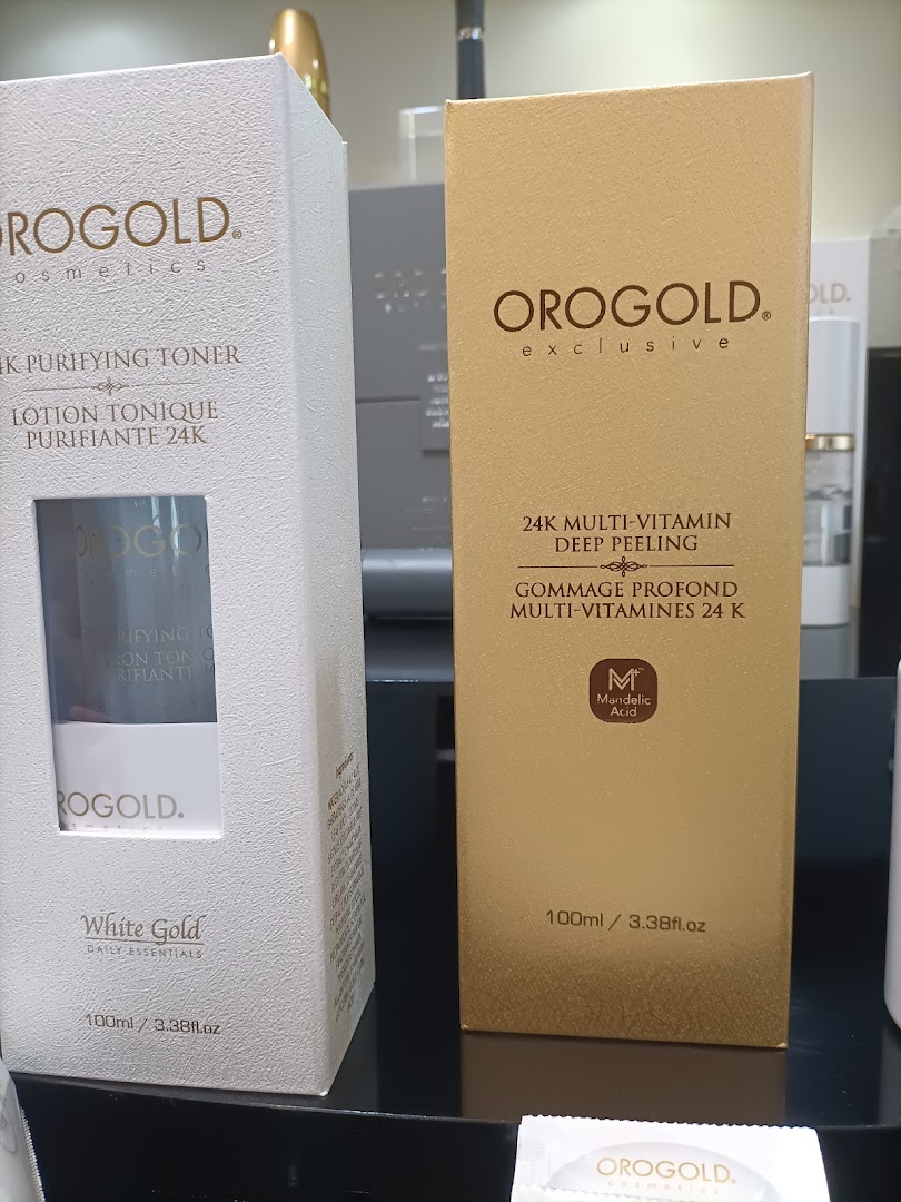 Two OROGOLD cosmetic product boxes, a 24K Purifying Toner and a 24K Multi-Vitamin Deep Peeling.