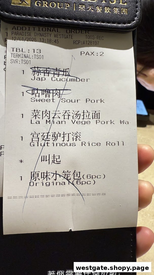 A close-up of an order slip from Paradise Dynasty Westgate listing various food items.