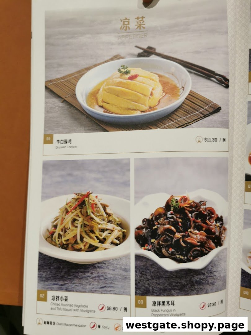 A menu page from Paradise Dynasty showcasing appetizers like Drunken Chicken and chilled vegetable dishes.