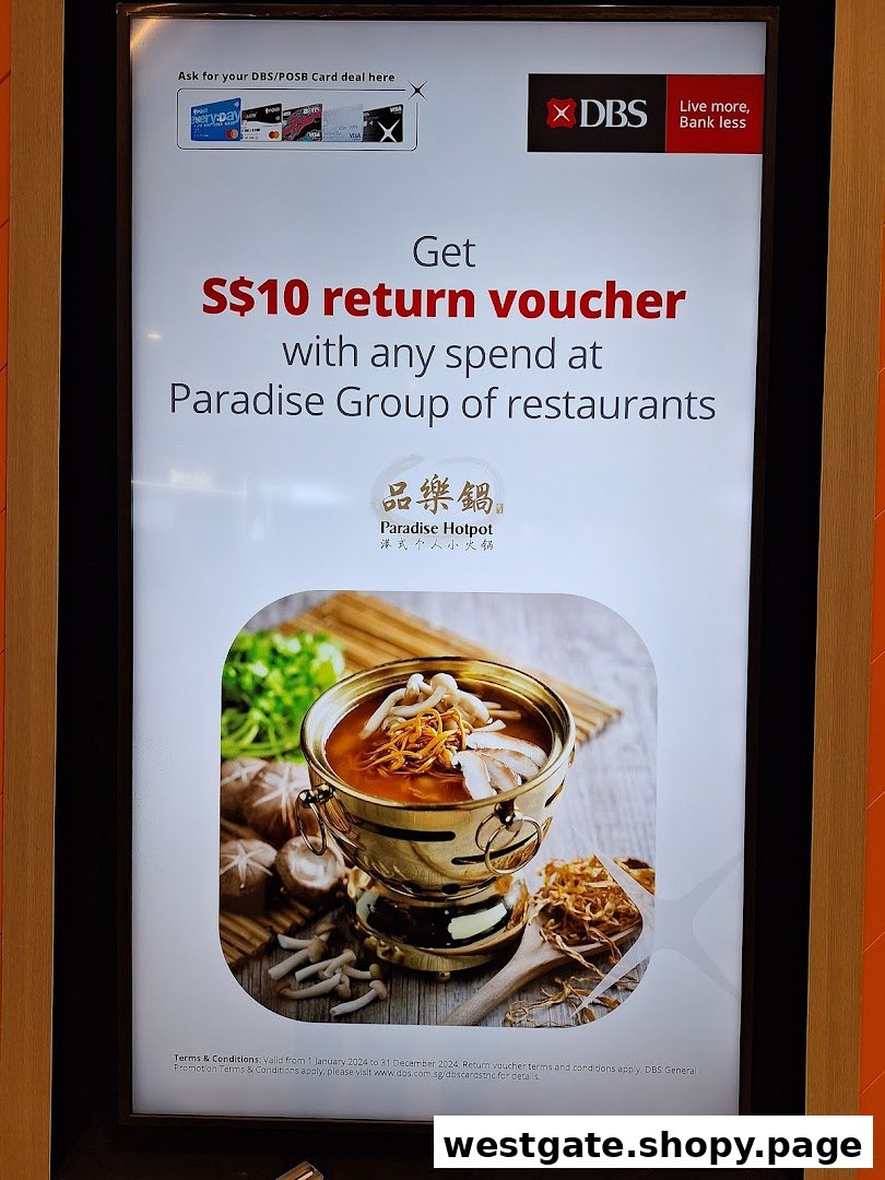 An advertisement for a DBS/POSB S$10 return voucher at Paradise Group restaurants.