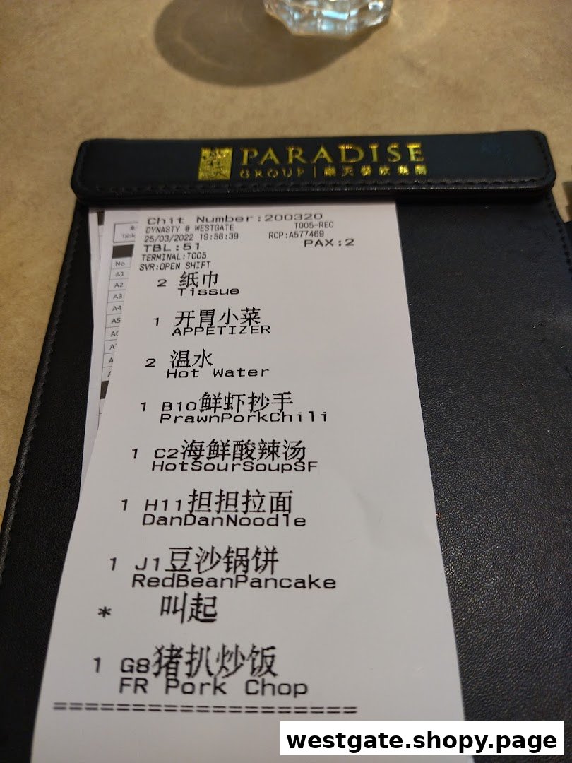 An order chit from Paradise Dynasty at Westgate, listing various food items.