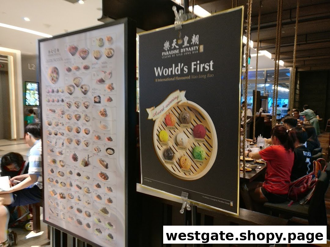 Two large display boards showcasing Paradise Dynasty's unique Xiao Long Bao and other dishes at the shop entrance.