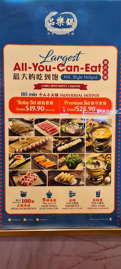 A promotional board for Paradise Hotpot, detailing their all-you-can-eat Hong Kong style hotpot sets and offerings.