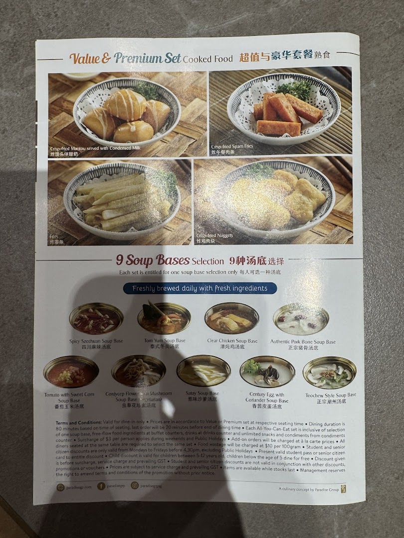 A detailed menu showcasing cooked food items and nine hotpot soup bases from Paradise Hotpot.