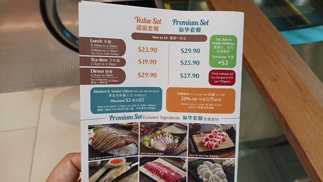 A detailed menu displaying pricing for Value and Premium hotpot sets across different meal times and days.