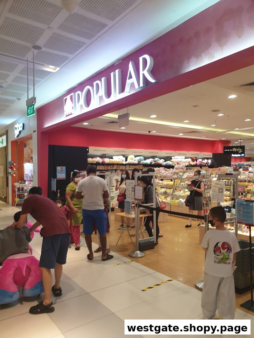The entrance of POPULAR Bookstore with its prominent signage and customers inside.