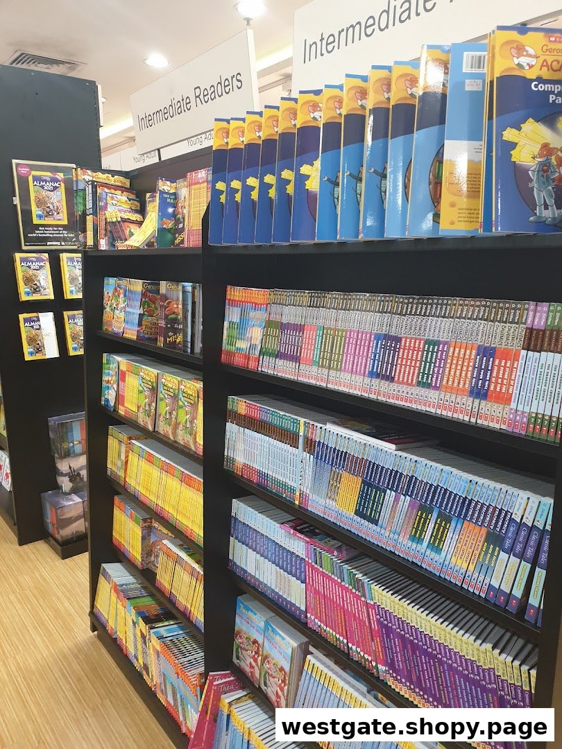 Shelves filled with diverse books, including sections for Intermediate Readers and Young Adult, at POPULAR Bookstore.