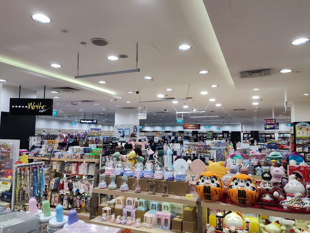 Interior view of POPULAR Bookstore, showcasing books, stationery, gadgets, and gifts.