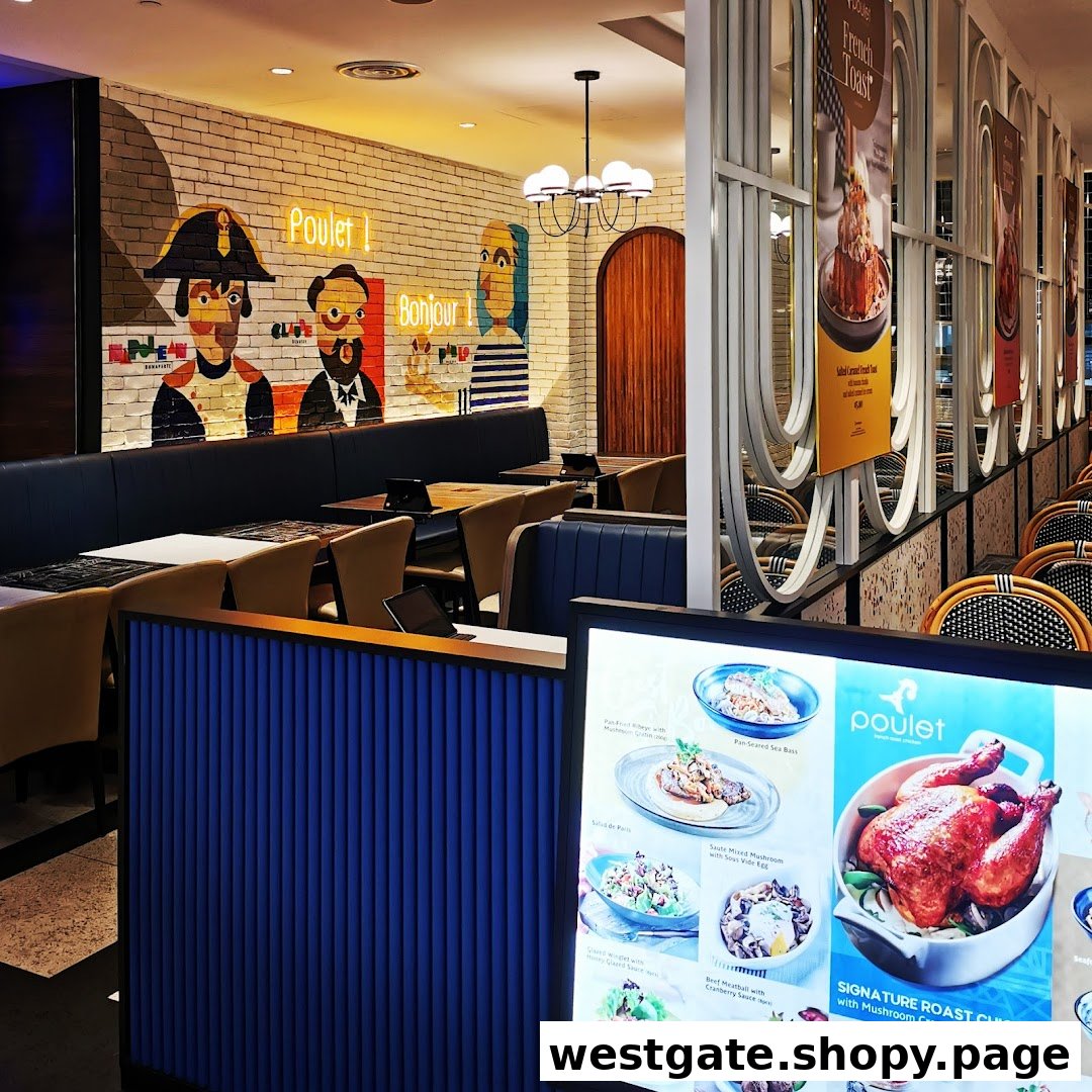 The inviting interior of Poulet restaurant featuring French-themed decor and a digital menu display.
