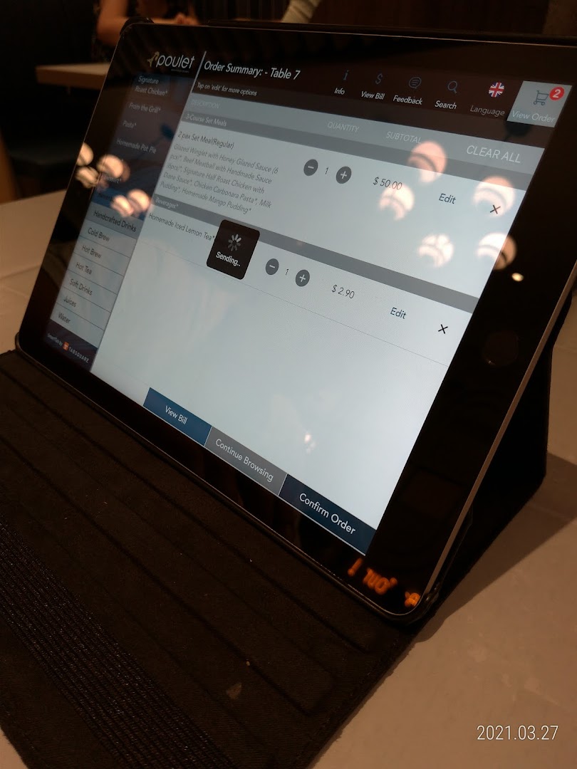 A digital tablet displaying an order summary for Poulet, showing set meals and beverages.