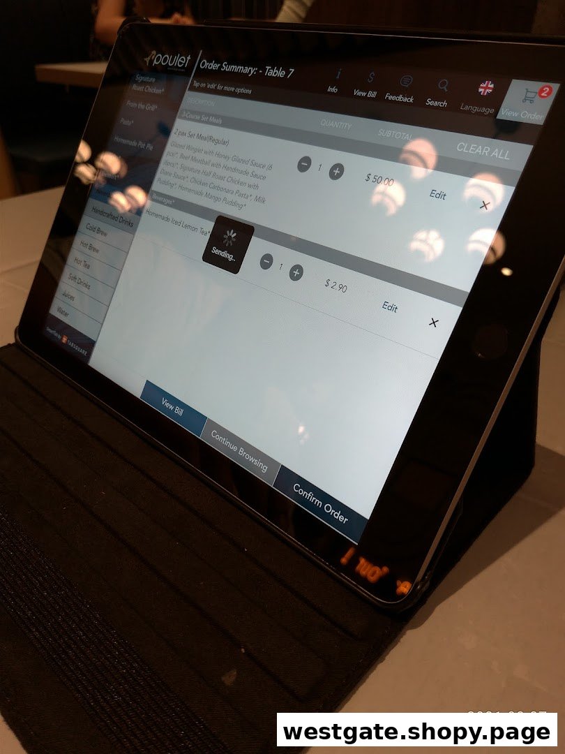 A digital tablet displaying an order summary for Poulet, showing set meals and beverages.