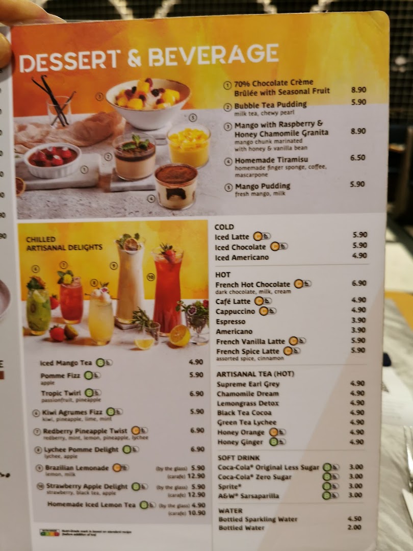 A detailed menu displaying a variety of desserts and beverages with prices.