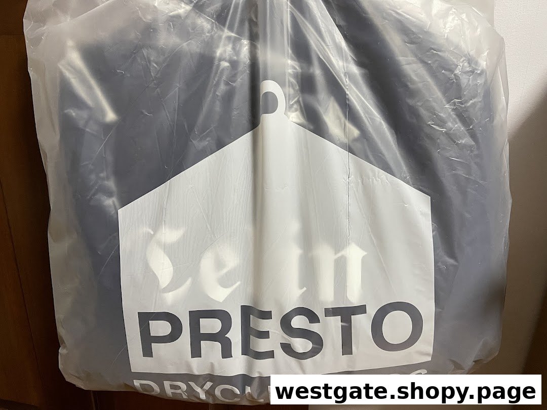 A dry-cleaned garment in a clear plastic bag featuring the Presto Drycleaners logo.