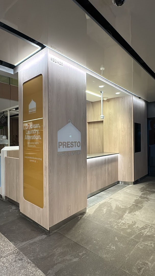 The modern and well-lit storefront of Presto Drycleaners, offering garment care services.
